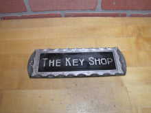 Load image into Gallery viewer, THE KEY SHOP Antique Reverse on Chip Scalloped Glass Advertising Sign ROG