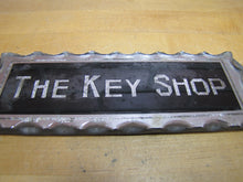 Load image into Gallery viewer, THE KEY SHOP Antique Reverse on Chip Scalloped Glass Advertising Sign ROG