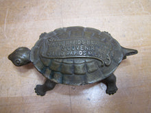 Load image into Gallery viewer, GRAND RAPIDS BRASS Co MICH Mfgr's Refrigerator & Furniture Hdw Old Match Holder Figural Turtle Advertising