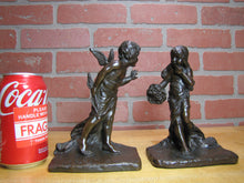 Load image into Gallery viewer, CUPID CHERUB GIRL FLOWERS c1912 Bookends GRIFFOUL FOUNDRY NEWARK M PEINLICH SCP