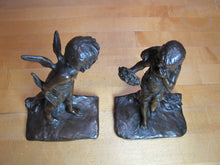 Load image into Gallery viewer, CUPID CHERUB GIRL FLOWERS c1912 Bookends GRIFFOUL FOUNDRY NEWARK M PEINLICH SCP