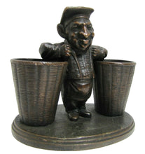 Load image into Gallery viewer, Man with Baskets Old Figural Match Holders Double Matchstick Striker Art