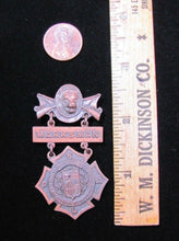 Load image into Gallery viewer, REMINGTON ARMS UNION METALLIC CARTRIDGE Co MARKSMAN Antique Pin Medallion D&C NY