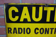 Load image into Gallery viewer, CAUTION RADIO CONTROLLED LOCOMOTIVE IN OPERATION Old Porcelain Sign RR Train