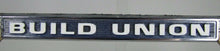 Load image into Gallery viewer, BUILD UNION BUY AMERICAN Original Old License Plate Frame Made in USA Sign Ad