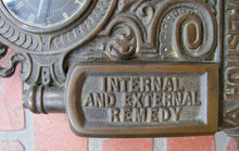 Load image into Gallery viewer, STANTONS PAIN RELIEF REMEDY 19c Quack MedicIne Drug Store Sign Advertising Clock