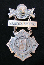 Load image into Gallery viewer, REMINGTON ARMS UNION METALLIC CARTRIDGE Co MARKSMAN Antique Pin Medallion D&C NY