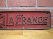 Load image into Gallery viewer, AMERICAN LAFRANCE Antique Cast Iron Embossed Plaque Fire Trk Sign REG US PAT OFF