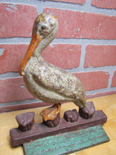 Load image into Gallery viewer, PELICAN ON DOCK Antique Cast Iron Doorstop Decorative Art Statue ALBANY FOUNDRY