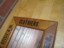 Load image into Gallery viewer, E D STEELE & Co ST JOHNSBURY VT CLOTHIERS HATTERS Antique Wooden Frame Advertising Mirror Sign Impressed Lettering