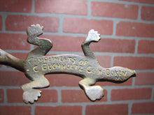 Load image into Gallery viewer, COMPLIMENTS OF C BUCHHOLTZ Co HOBOKEN NJ Antique Advertising Gecko Lizard Brass Bronze Foundry Company Ad