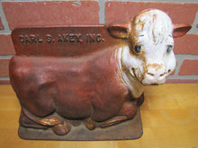 Load image into Gallery viewer, CARL AKEY SAFE-GUARD Old Cast Iron Figural Cow Farm Swine Medicine Advertising Doorstop Bootscraper Statue Store Display