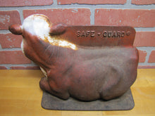 Load image into Gallery viewer, CARL AKEY SAFE-GUARD Old Cast Iron Figural Cow Farm Swine Medicine Advertising Doorstop Bootscraper Statue Store Display
