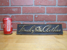 Load image into Gallery viewer, TIMELY CLOTHES Old Store Display Sign BRONZE-CRAFT ADCO NY Counter Register Top