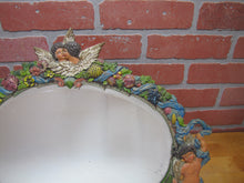 Load image into Gallery viewer, Antique Cherubs Putto Evil Face Bevel Edge Mirror Easel Back Ornate Paint Detail
