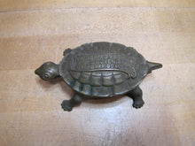 Load image into Gallery viewer, GRAND RAPIDS BRASS Co MICH Mfgr's Refrigerator &amp; Furniture Hdw Old Match Holder Figural Turtle Advertising
