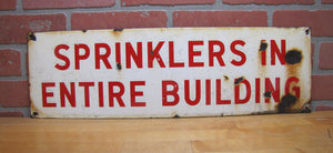 SPRINKLERS IN ENTIRE BUILDING Original Old Porcelain Fire Safety Ad Sign Patina
