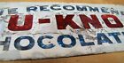U-KNO CHOCOLATES Antique Reverse Glass Sign Reflective Candy Store Display Ad