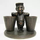 Man with Baskets Old Figural Match Holders Double Matchstick Striker Art