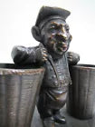 Man with Baskets Old Figural Match Holders Double Matchstick Striker Art