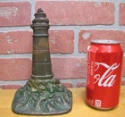 Load image into Gallery viewer, LIGHTHOUSE Old Cast Iron Rocks Waves Figural Doorstop Decorative Art Statue
