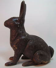 Load image into Gallery viewer, Antique Cast Iron Chocolate Bunny Rabbit Doorstop old paint early 1900s era art
