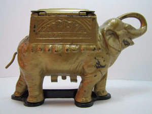 Old Cast Iron Elephant Cigarette Dispenser 'pat pend' tail roller orig gold blk