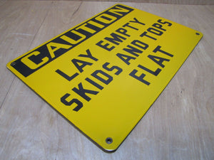 CAUTION LAY EMPTY SKIDS AND TOPS FLAT Old Porcelain Sign Yellow Black Industrial