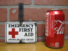 Load image into Gallery viewer, Old Porcelain AMERICAN RED CROSS EMERGENCY FIRST AID Sign Plate Topper Ad
