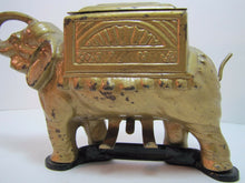 Load image into Gallery viewer, Old Cast Iron Elephant Cigarette Dispenser &#39;pat pend&#39; tail roller orig gold blk
