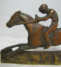 Load image into Gallery viewer, Vintage Jockey riding Horse Bookends brass copper wash ornate detailing rare htf
