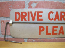 Load image into Gallery viewer, DANGEROUS DRIVE CAREFULLY PLEASE QUICK-WAY MUSKEGON MICHIGAN Old Spinner Ad Sign
