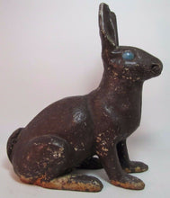 Load image into Gallery viewer, Antique Cast Iron Chocolate Bunny Rabbit Doorstop old paint early 1900s era art
