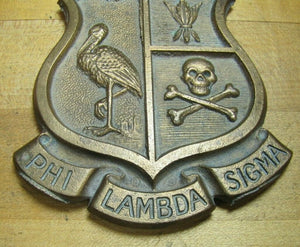 Old PHI LAMBDA SIGMA Brass Medallion Skull Crossbones Embossed Badge Fraternal