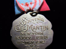 Load image into Gallery viewer, 1883 1912 CAFE MARTIN NEW YORK Souvenir Medallion Flag Ribbon Dieges Clust NY
