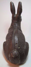 Load image into Gallery viewer, Antique Cast Iron Chocolate Bunny Rabbit Doorstop old paint early 1900s era art
