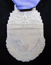 Load image into Gallery viewer, 1938 NATIONAL ASSN of RETAIL DRUGGISTS CHICAGO Convention Ribbon Medallion
