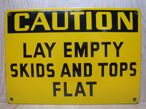 CAUTION LAY EMPTY SKIDS AND TOPS FLAT Old Porcelain Sign Yellow Black Industrial