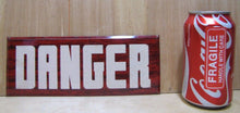Load image into Gallery viewer, Old DANGER Sign tin faux wood grain hetrolite style gas station store shop
