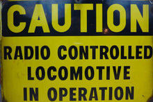 Load image into Gallery viewer, CAUTION RADIO CONTROLLED LOCOMOTIVE IN OPERATION Old Porcelain Sign RR Train
