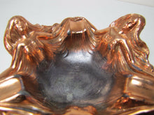 Load image into Gallery viewer, Vintage Three Beauties in Gowns Ashtray copper wash finish arms extended outward
