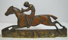 Load image into Gallery viewer, Vintage Jockey riding Horse Bookends brass copper wash ornate detailing rare htf

