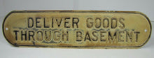 Load image into Gallery viewer, Old DELIVER GOODS THROUGH BASEMENT Sign embossed tin metal store advertising
