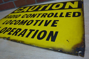 CAUTION RADIO CONTROLLED LOCOMOTIVE IN OPERATION Old Porcelain Sign RR Train