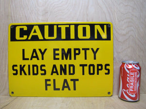 CAUTION LAY EMPTY SKIDS AND TOPS FLAT Old Porcelain Sign Yellow Black Industrial