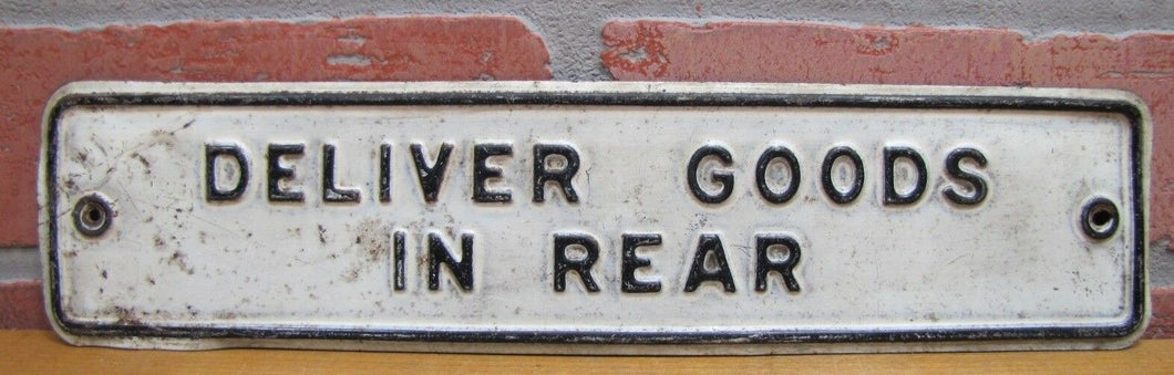 Old DELIVER GOODS IN REAR Tin Embossed Sign Backside Repair Shop Parts Store