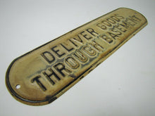 Load image into Gallery viewer, Old DELIVER GOODS THROUGH BASEMENT Sign embossed tin metal store advertising
