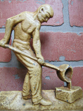 Load image into Gallery viewer, Antique Cast Iron Foundry Worker Doorstop &#39;REYCO&#39; Man Pouring Mold Door Stop
