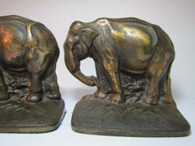 Load image into Gallery viewer, Grazing Elephants Bookends Old Cast Iron Pair Bronze Wash High Relief Detailed
