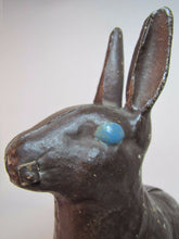Load image into Gallery viewer, Antique Cast Iron Chocolate Bunny Rabbit Doorstop old paint early 1900s era art
